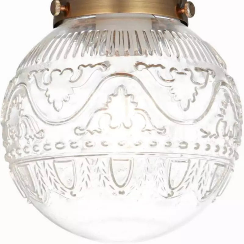 Close detail of the engraved globe pattern