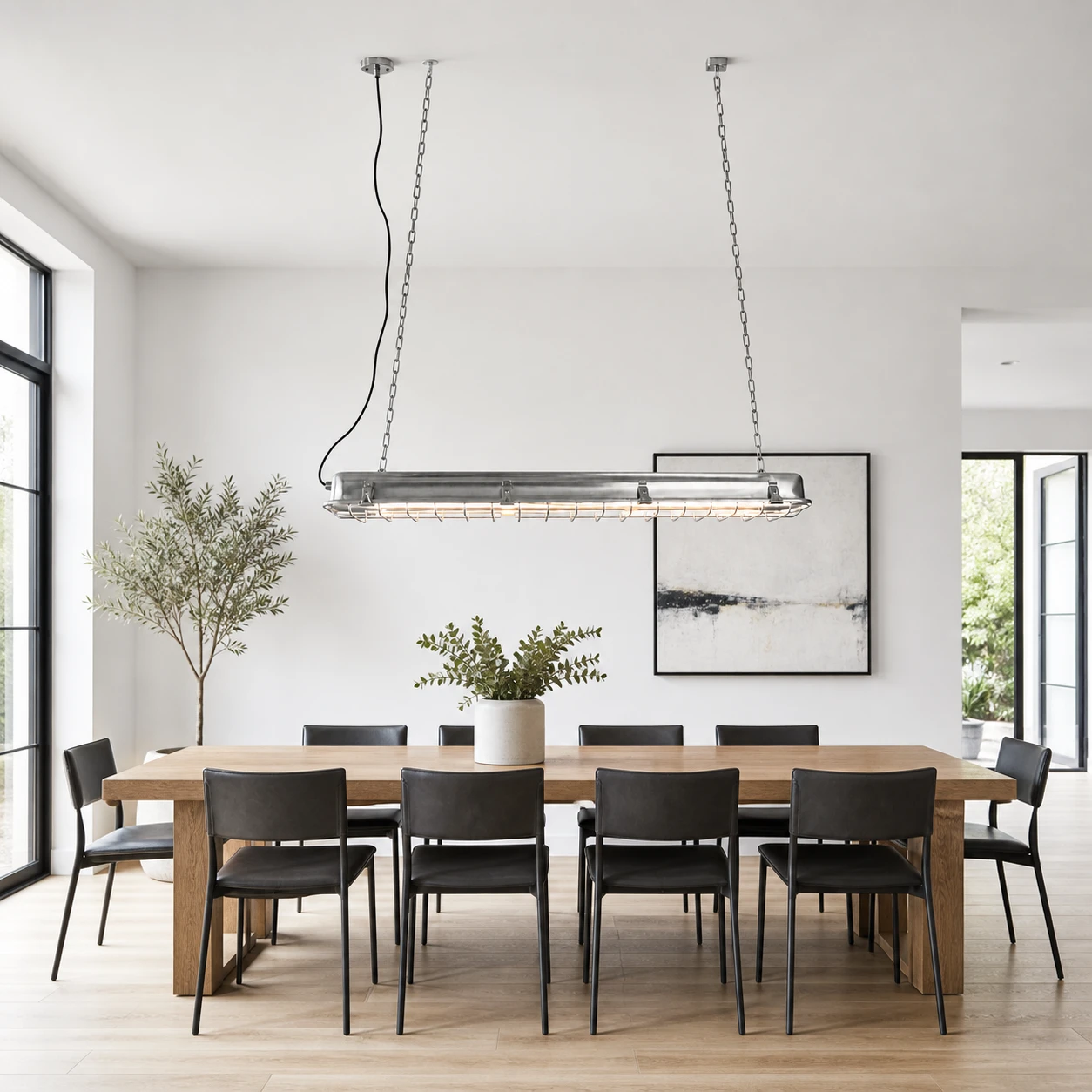 Linear cage pendant sized above a long dining table