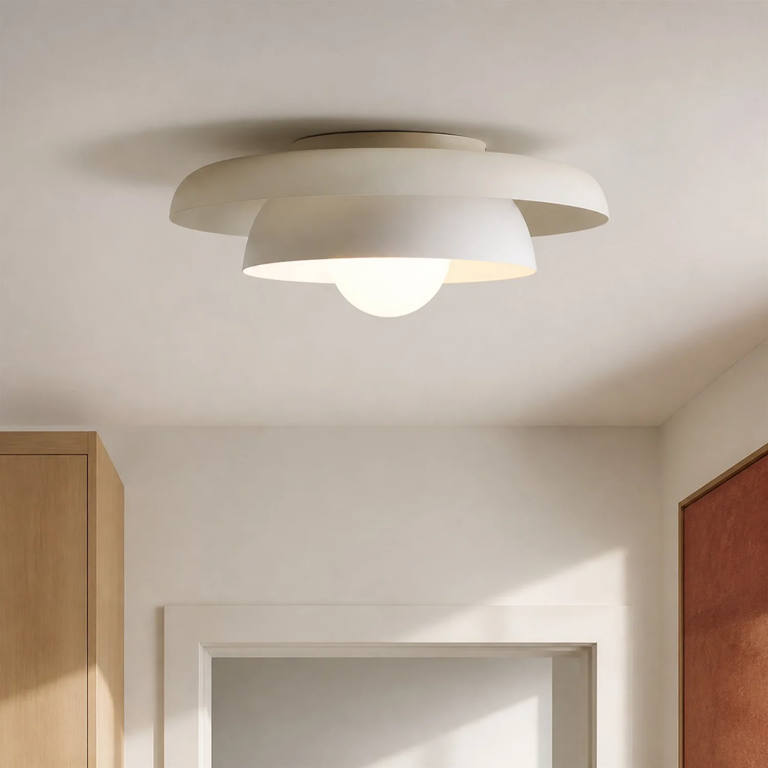 Cream-white Neso ceiling light in a doorway setting