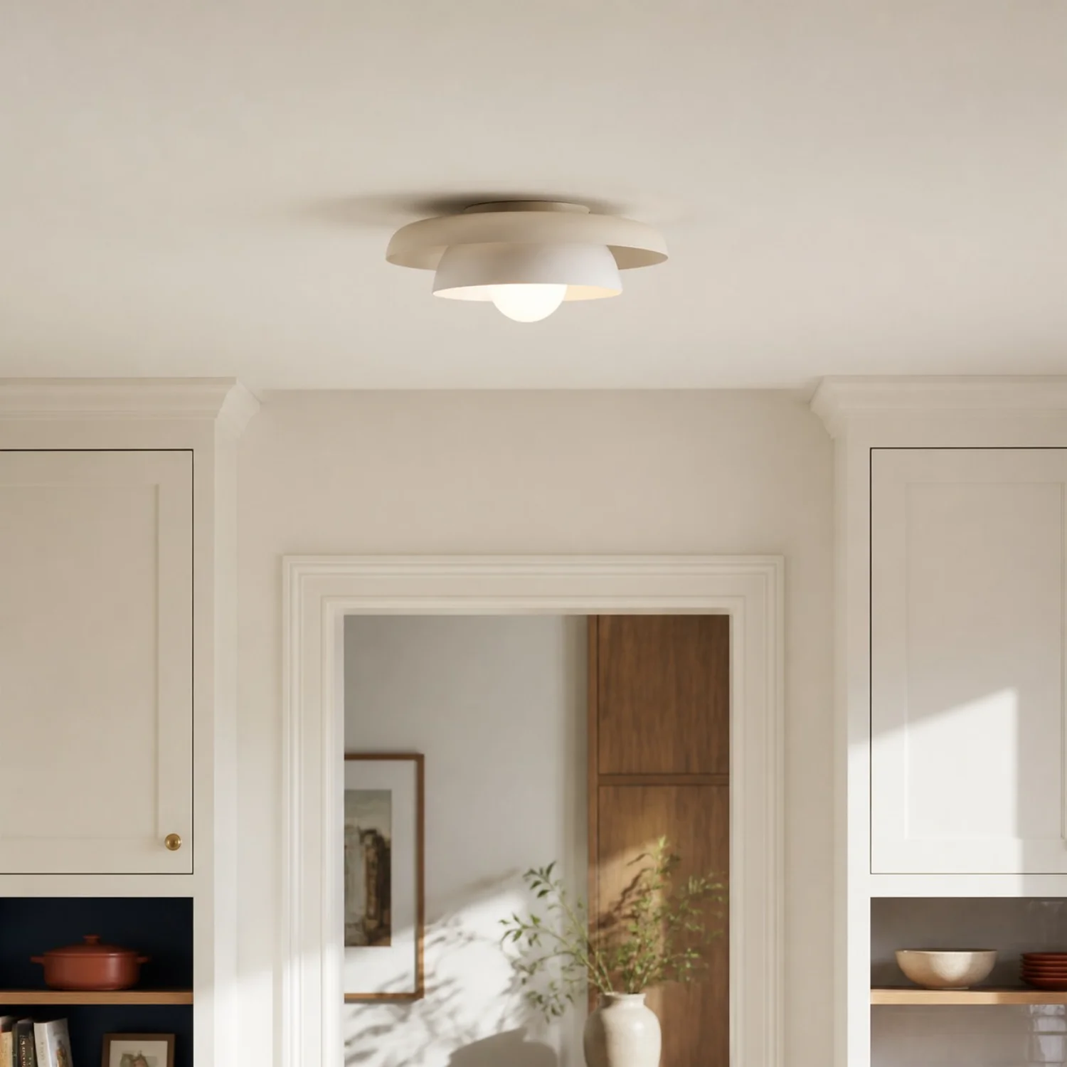 Cream-white Neso ceiling fixture above a kitchen doorway