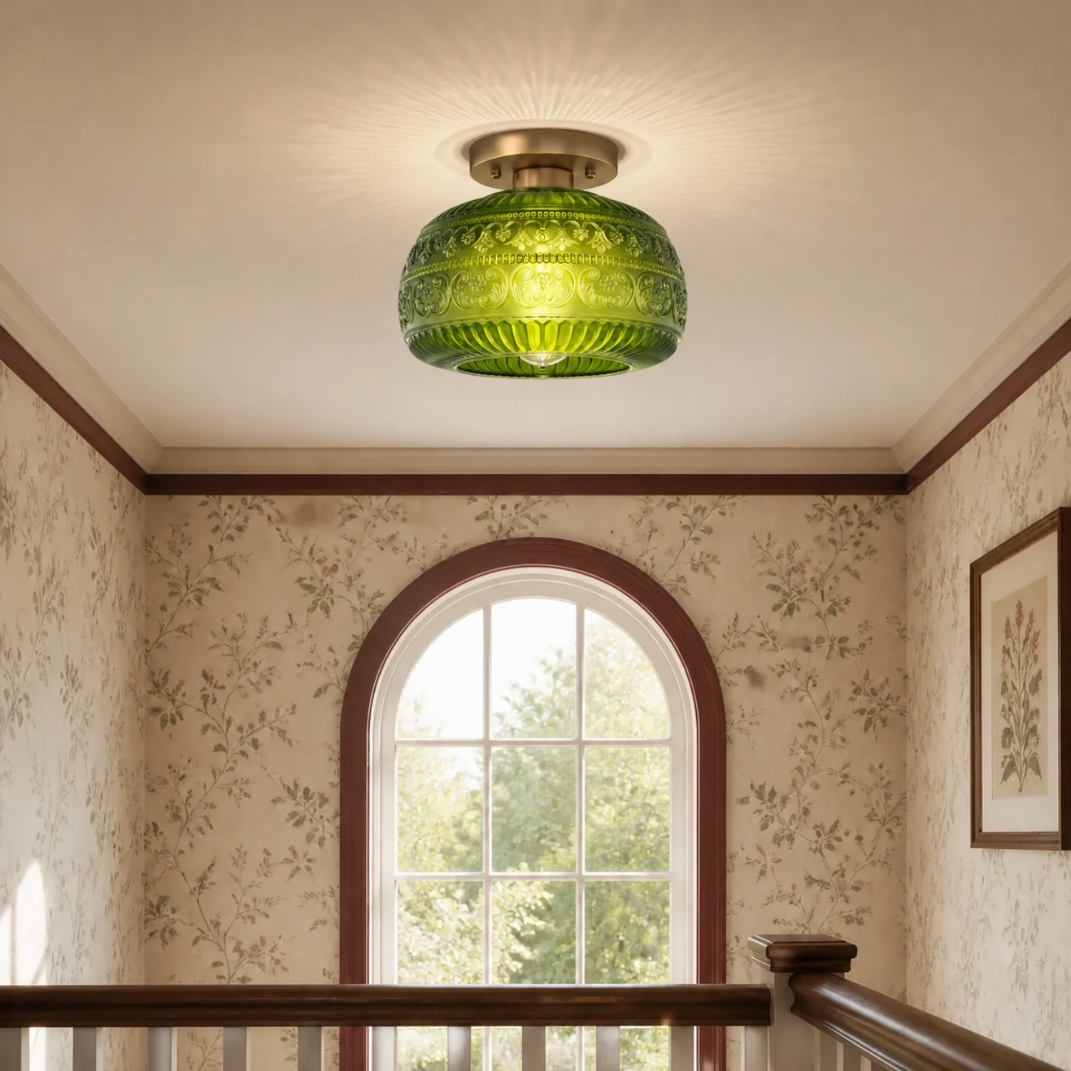 Oliver green carved glass ceiling light above a stair landing