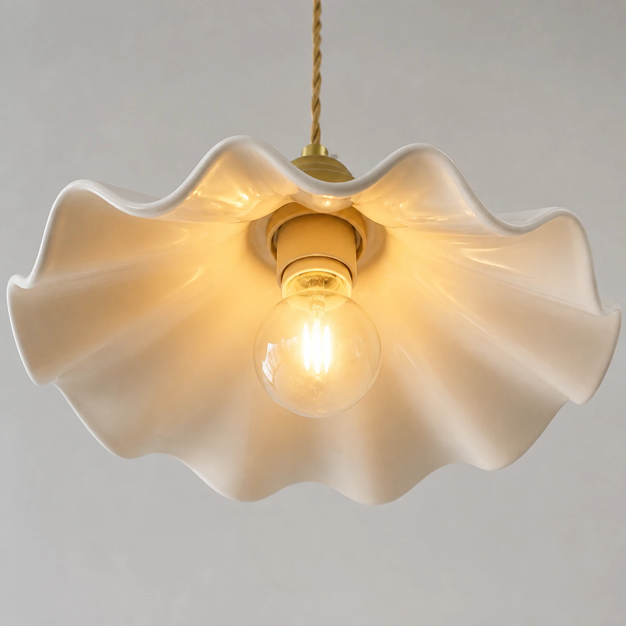 Ceramic wave edge and brass fitting detail