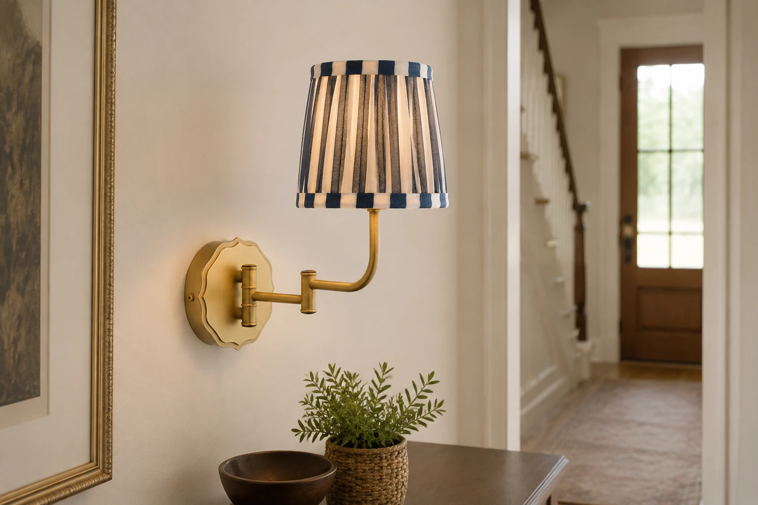 Denwick wall light in a family hallway above a console