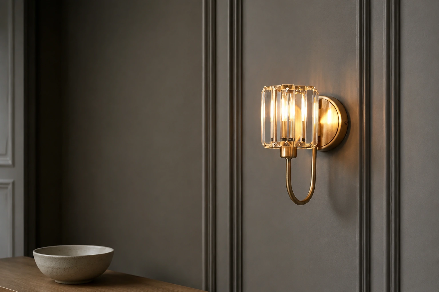 Berenice antique brass and cut glass wall light in a home entrance