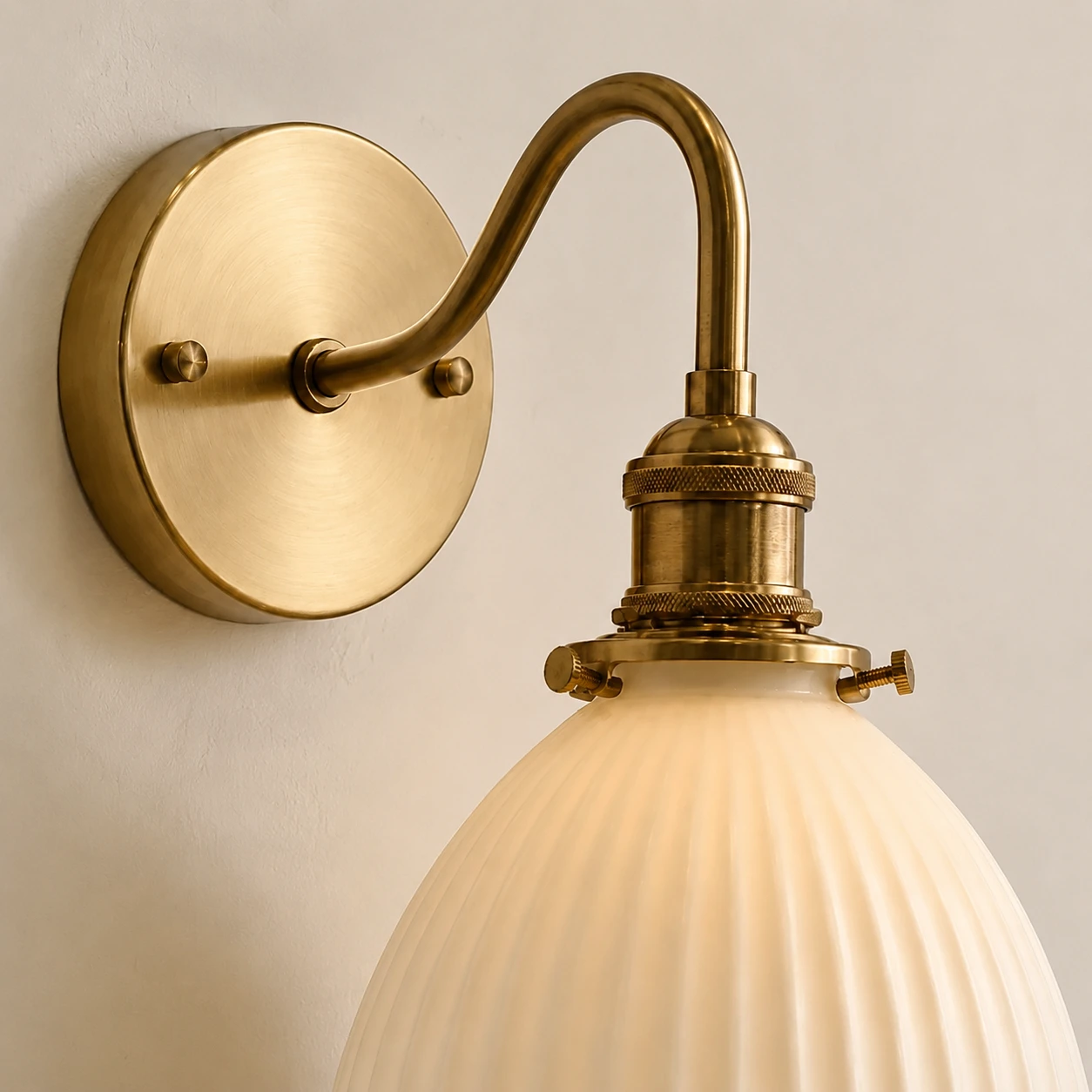 Antique brass lamp holder and ceramic shade connection detail