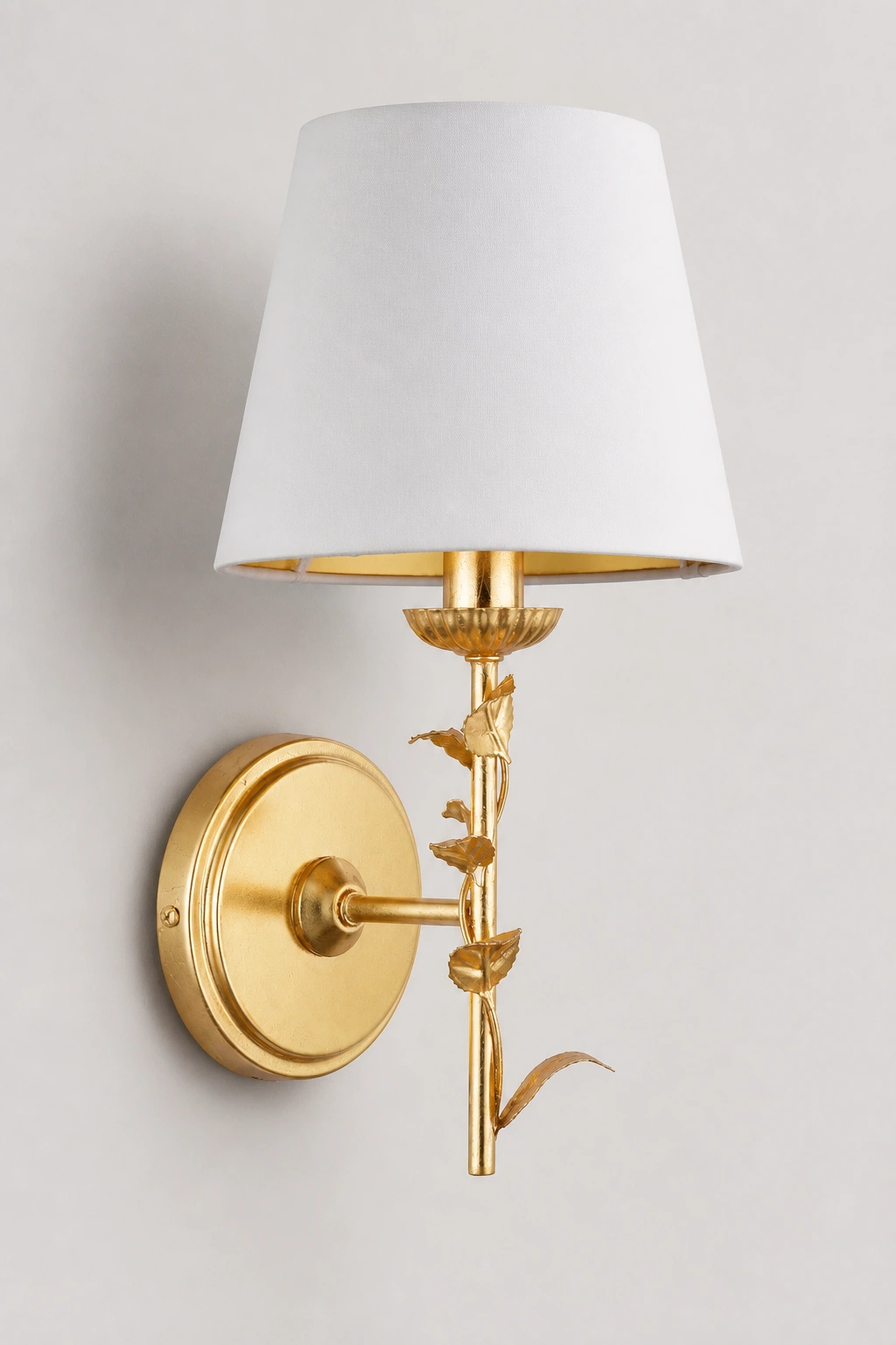 Complete Halton wall light with white fabric shade and distressed gold leaf finish on a neutral studio wall