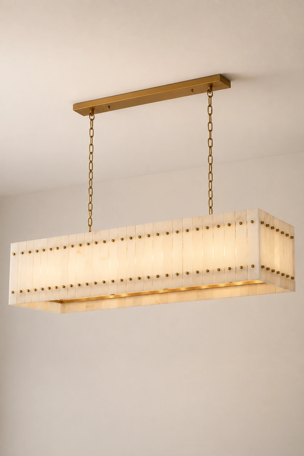 Complete Mervin 54-inch alabaster linear chandelier on a neutral studio background