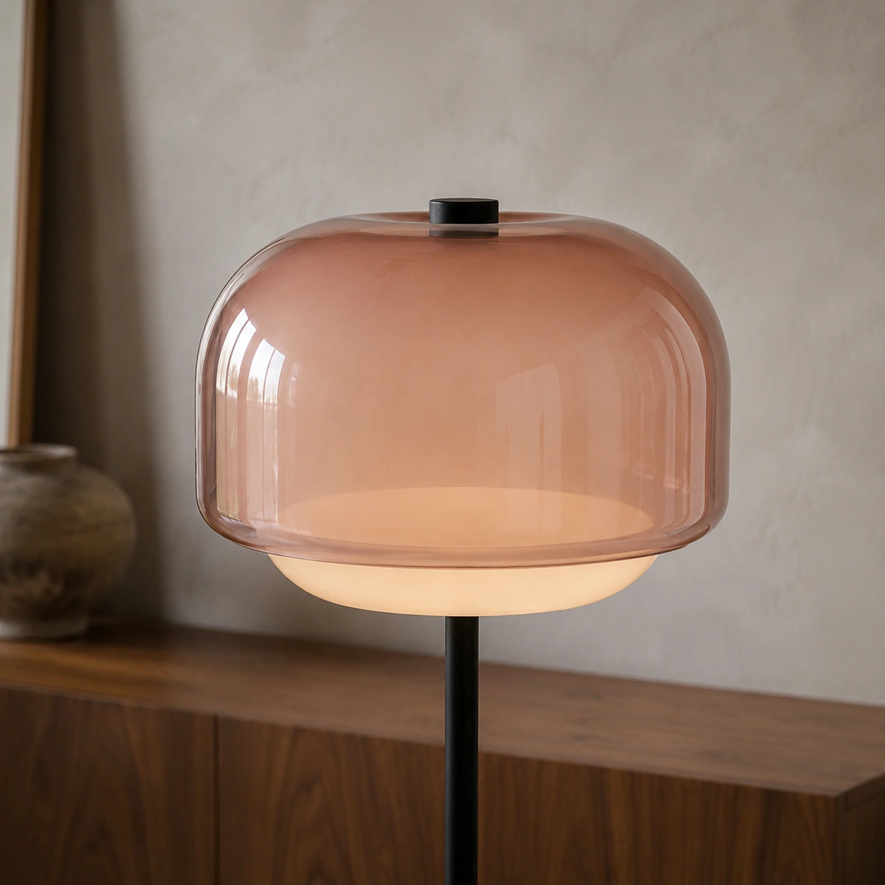 Close view of the Sanae nude colored glass shade above its milky white lower diffuser