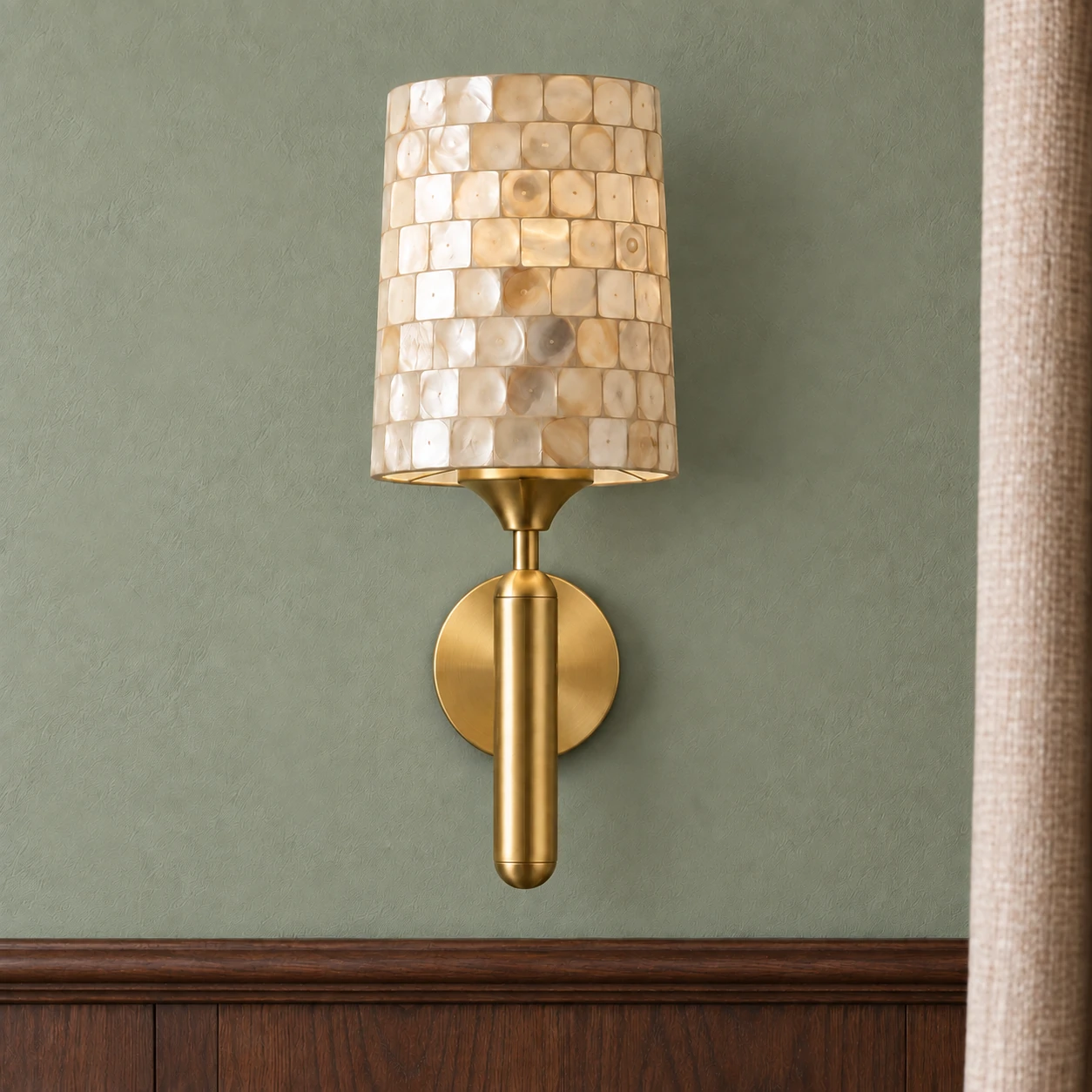Complete wall sconce against sage plaster and walnut architectural detail