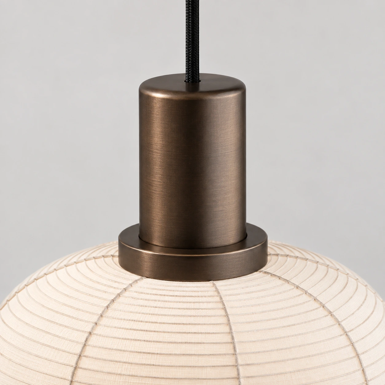 Dark bronze-toned cylindrical fitting and collar connecting to the Renée Style D gauze shade