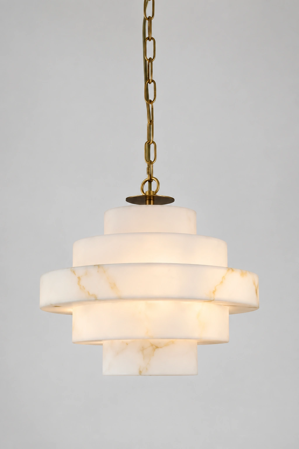 Complete five-tier ivory shade and hanging chain against a neutral background