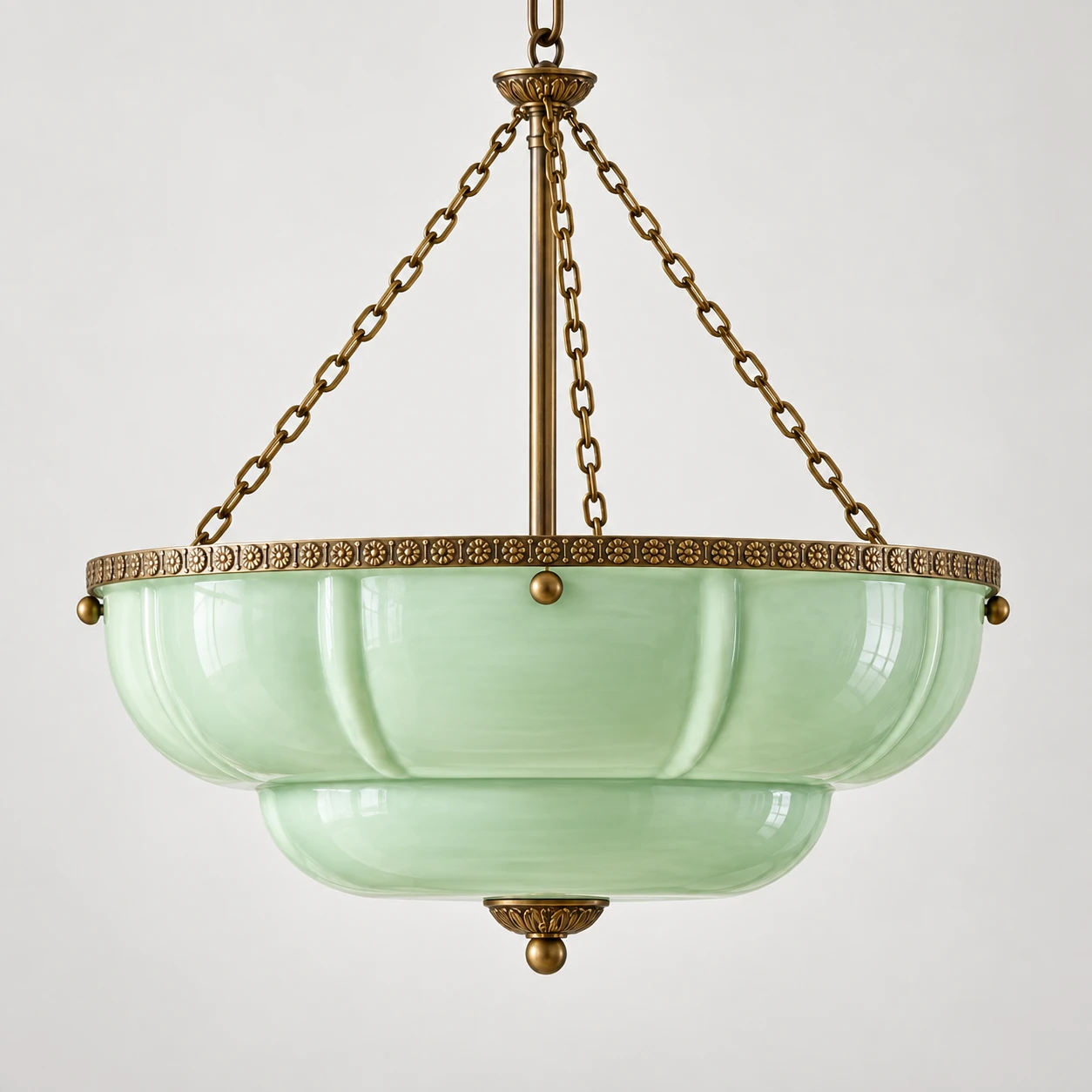 Side profile of the complete light-green lobed bowl with its narrow ornamented rim