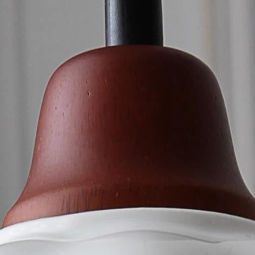 Close view of the ceramic shade and pendant cap