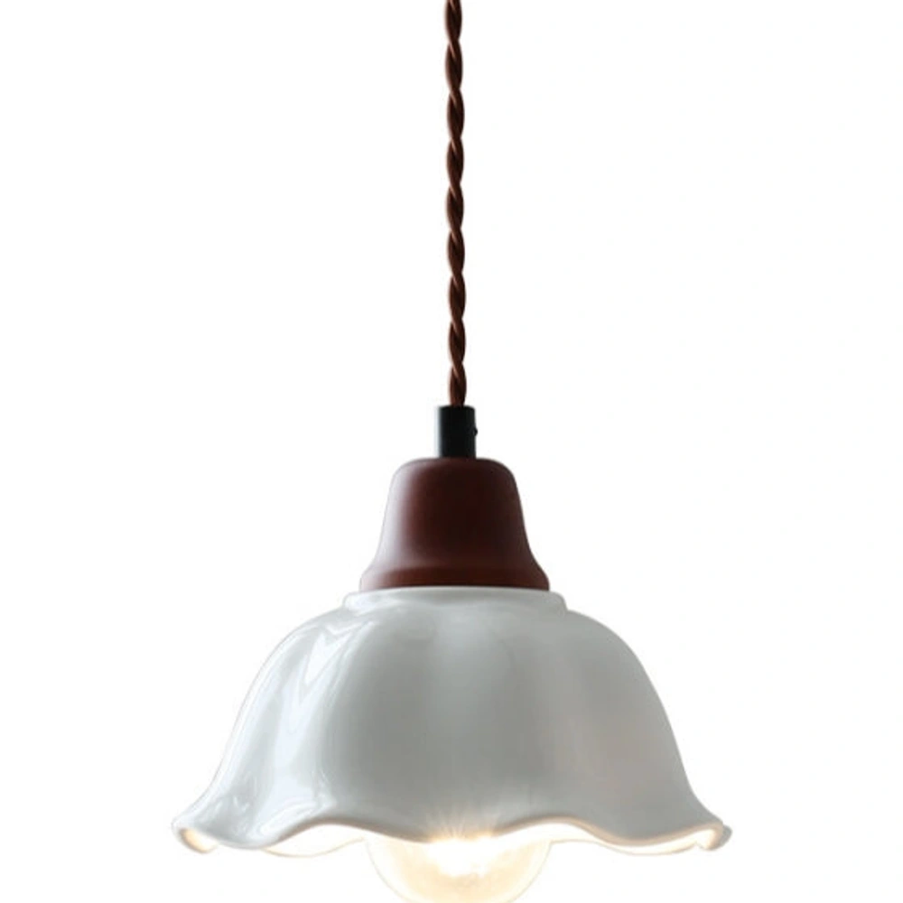 Close view of the warm LED glow beneath the shade