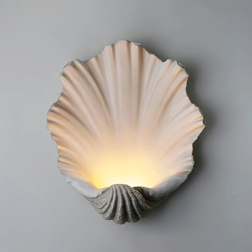 Close view of the shell-shaped resin shade with warm integrated LED glow