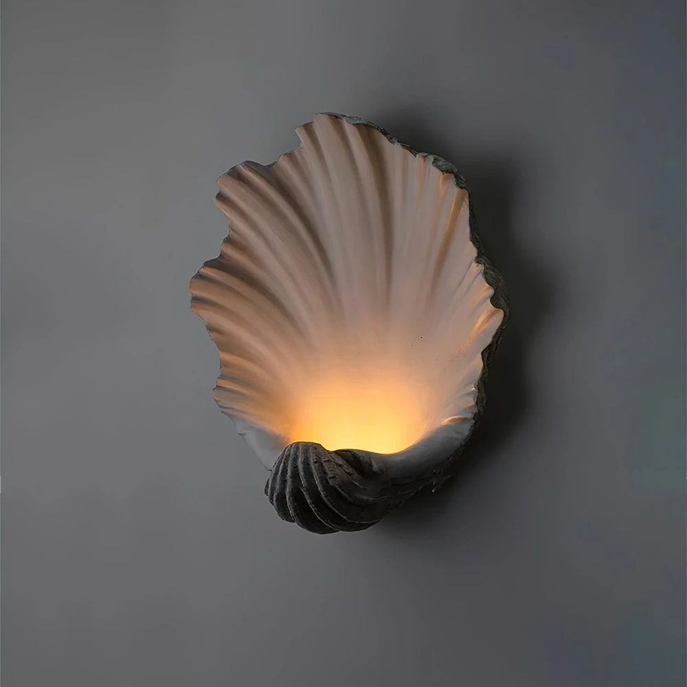 Close view of the sculptural shell profile and soft wall shadow