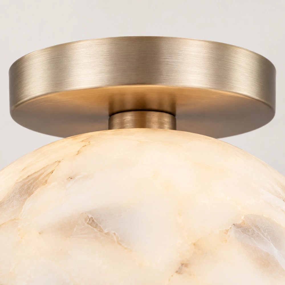 Macro view of brushed brass canopy and connector
